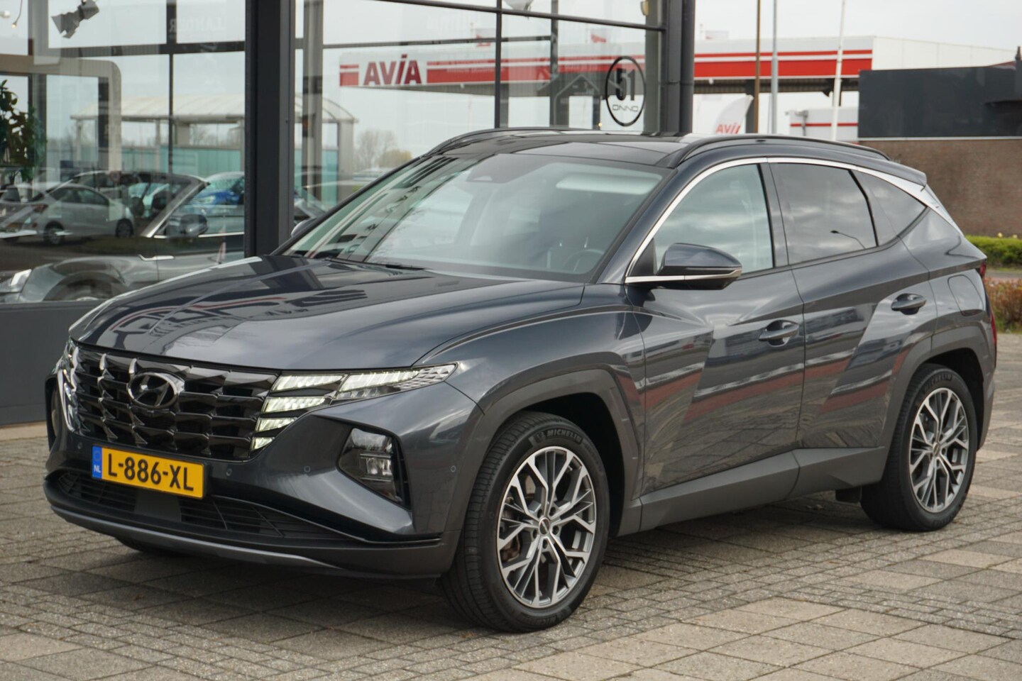 Hyundai Tucson - 1.6 T-GDI PHEV Premium Sky 4WD | PANO | Leer | Trekhaak - AutoWereld.nl