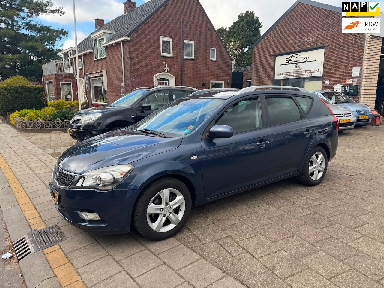 Kia Cee'd Sporty Wagon - 1.4 CVVT X-ecutive | Eerste eigenaar - AutoWereld.nl