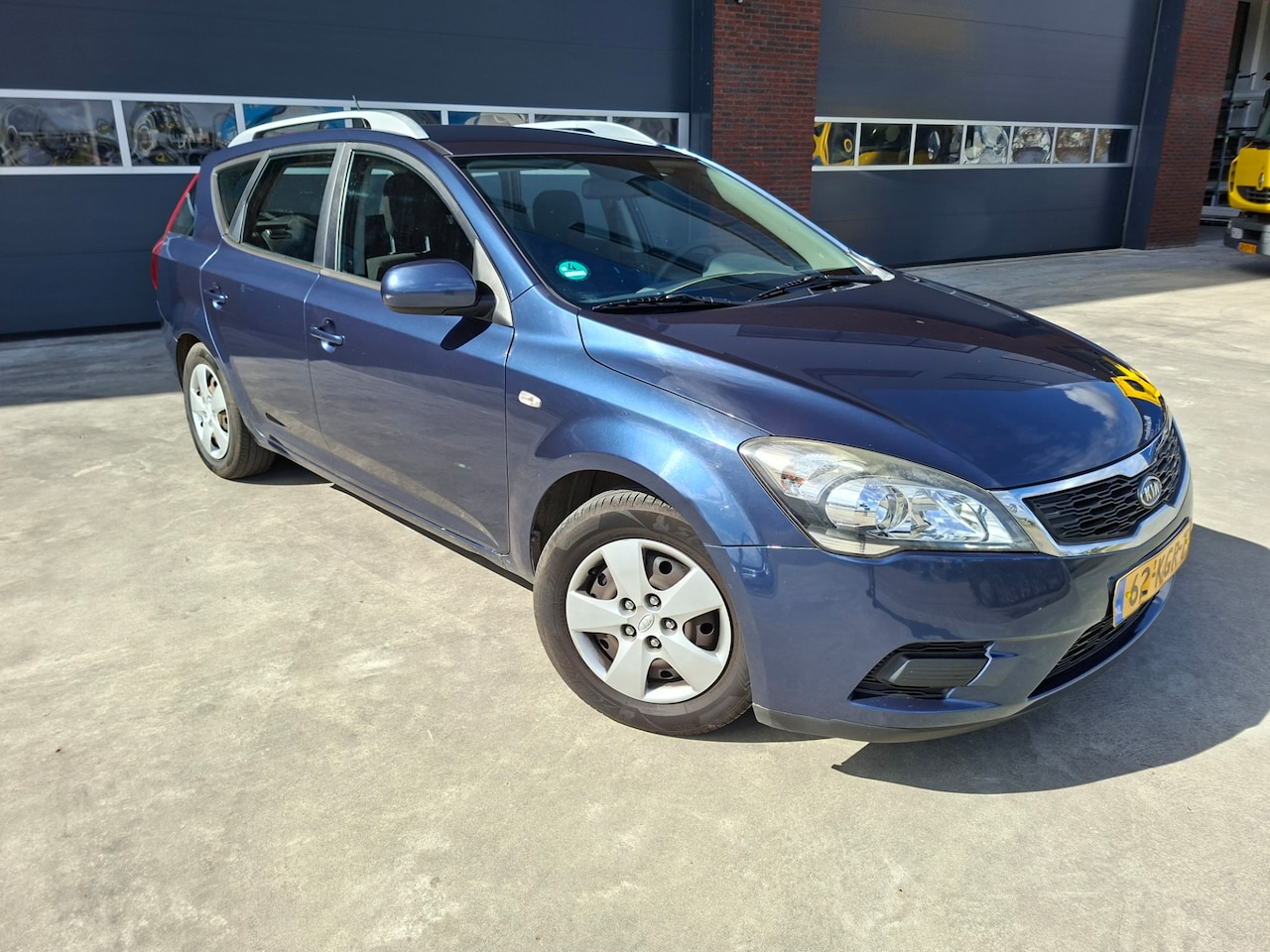 Kia Cee'd Sporty Wagon - 1.4 CVVT X-tra AIRCO - AutoWereld.nl