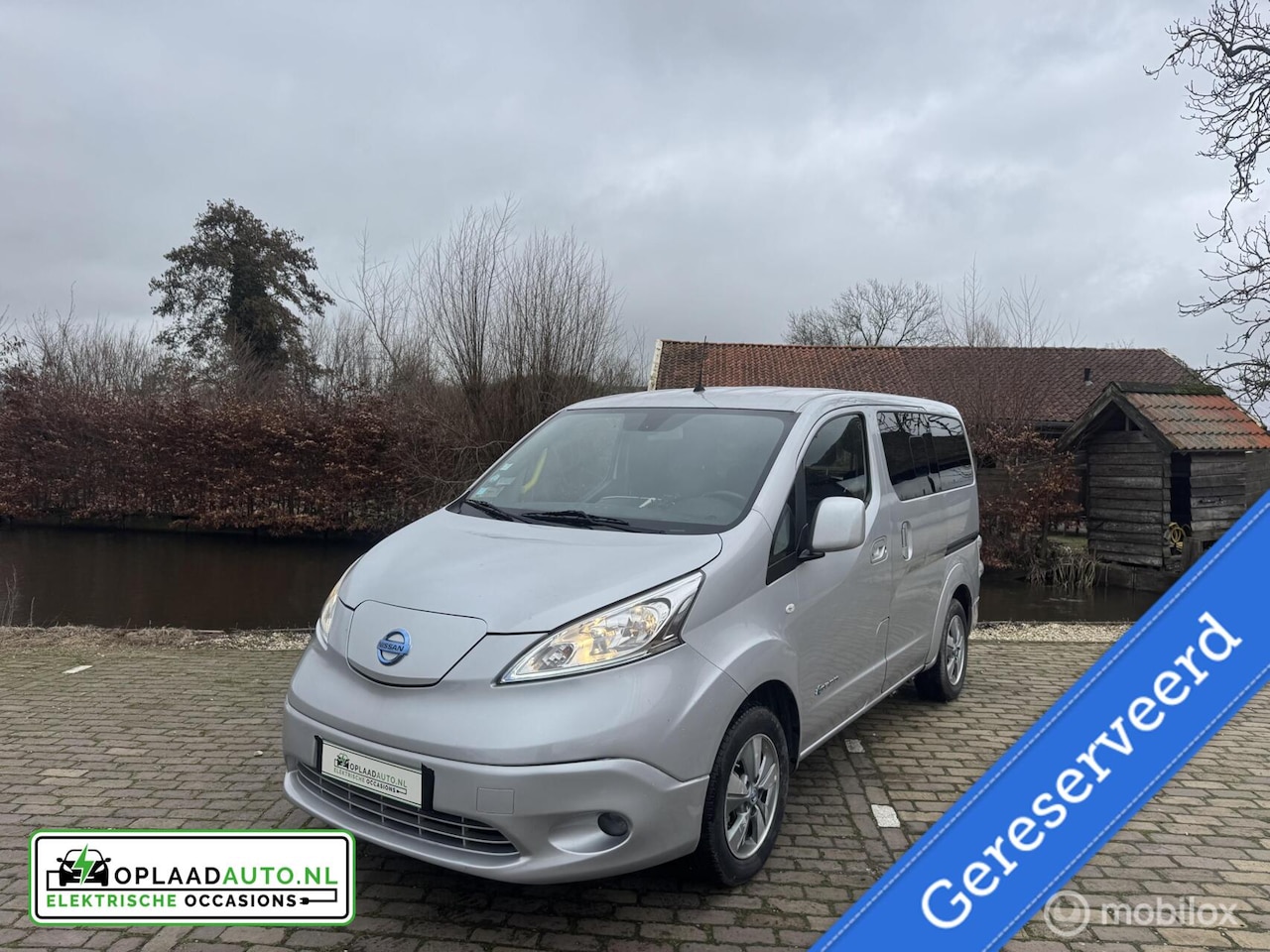Nissan e-NV200 Evalia - 40 kWh | Rolstoelbus | luchtvering - AutoWereld.nl