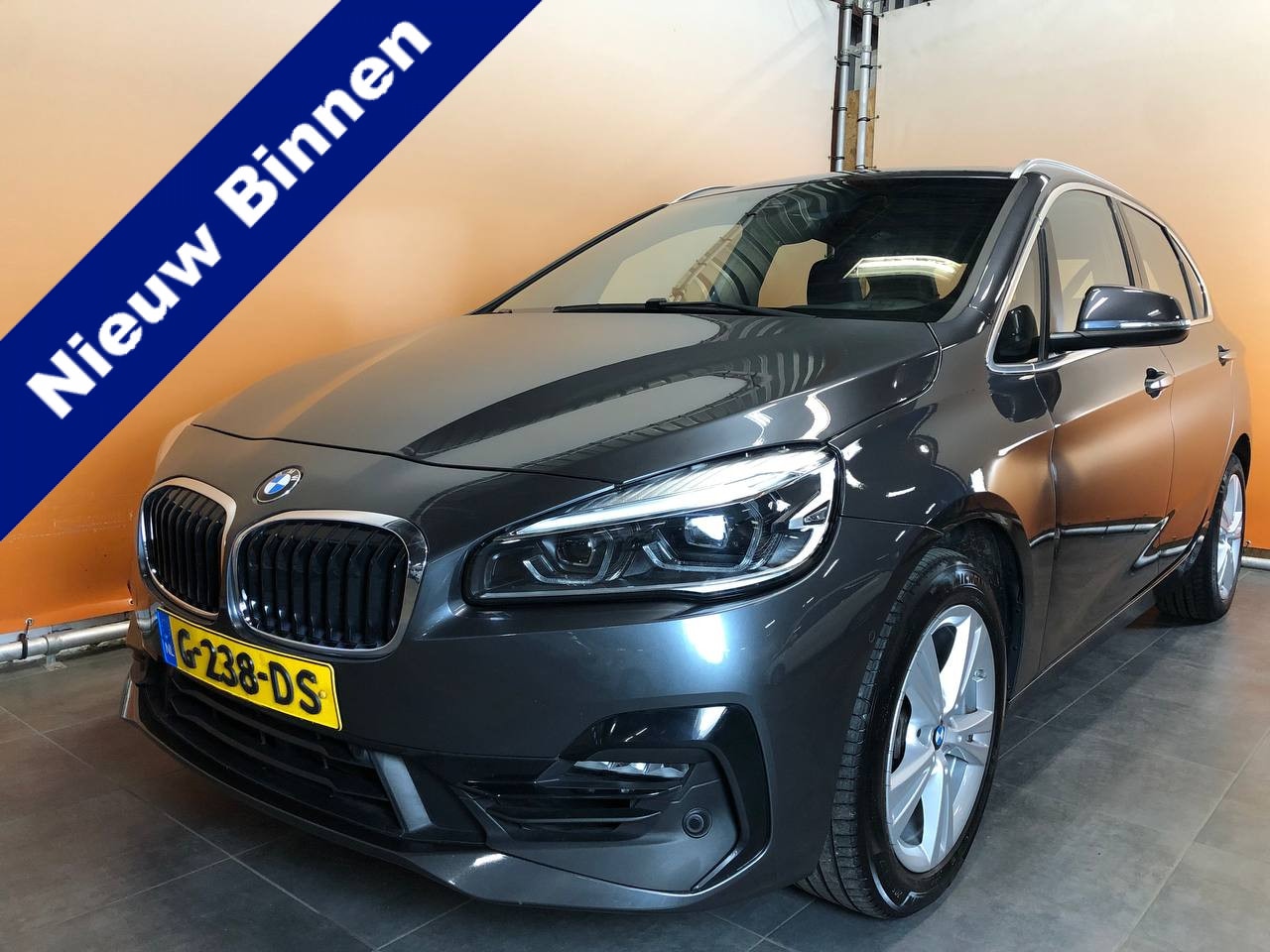 BMW 2-serie Active Tourer - 218i High Executive Edition sportint | leer | pano | stoelverw | navi | camera | cruise| h - AutoWereld.nl