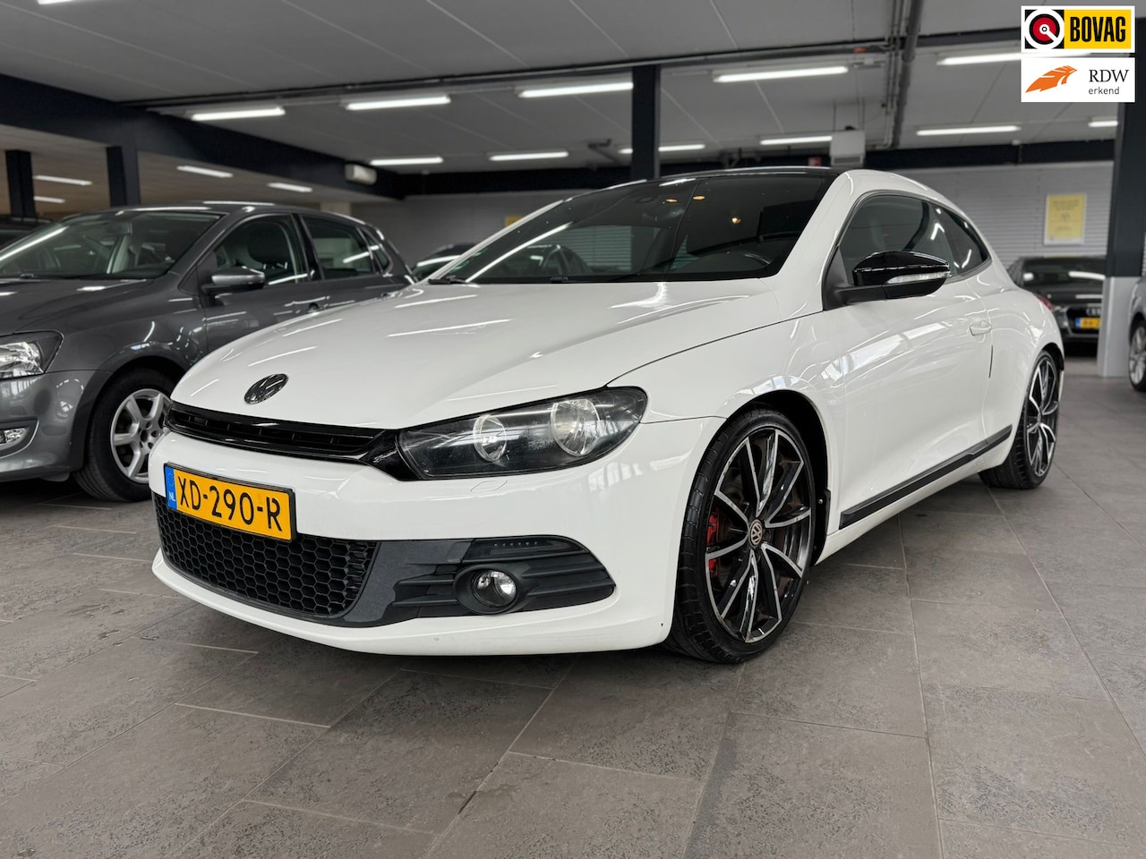 Volkswagen Scirocco - 1.4 TSI panoramadak half leer airco elektrische pakket parkeersensoren lm-velgen - AutoWereld.nl