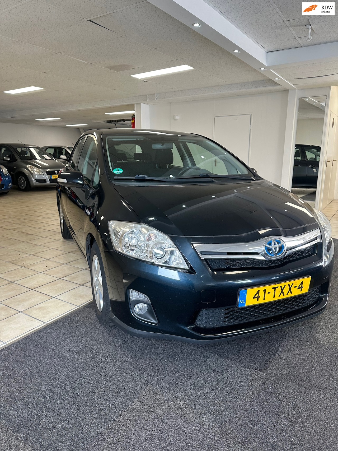 Toyota Auris - 1.8 Full Hybrid Business.eerste eigenaar, NAP KM - AutoWereld.nl