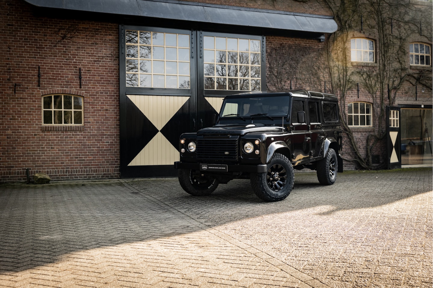 Land Rover Defender - 2.2Tdci Station Wagon Unieke uitvoering - AutoWereld.nl
