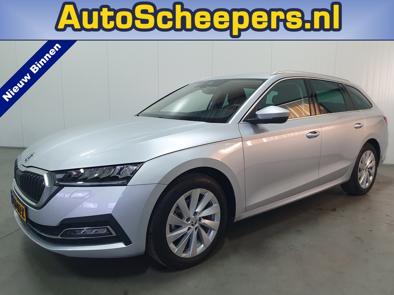 Skoda Octavia Combi - 1.0 e-TSI Business Edition NAVI/CARPLAY/LED/LMV/TRHAAK - AutoWereld.nl