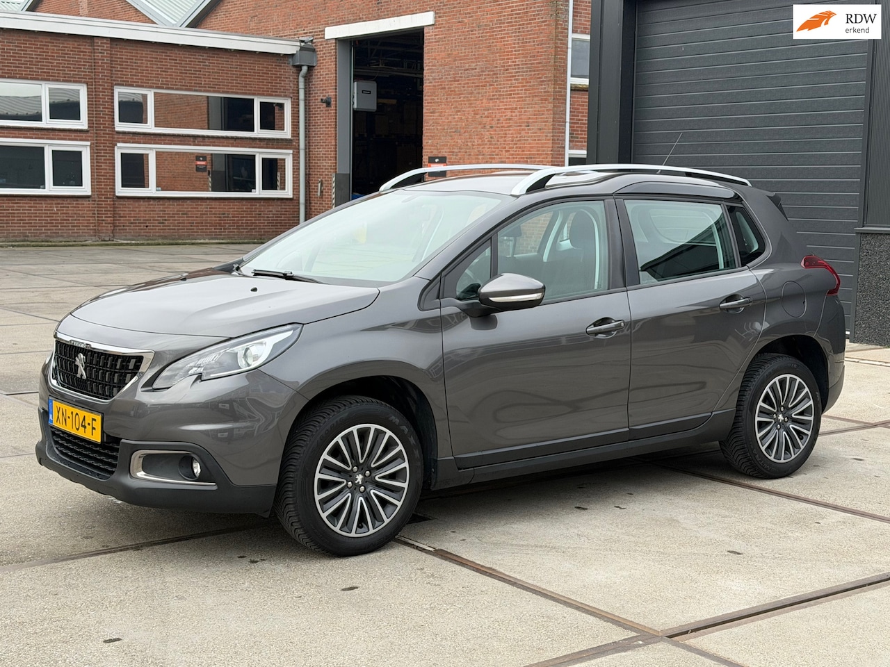Peugeot 2008 - 1.2 PureTech Active Navi Cruise Pdc Trekhaak - AutoWereld.nl