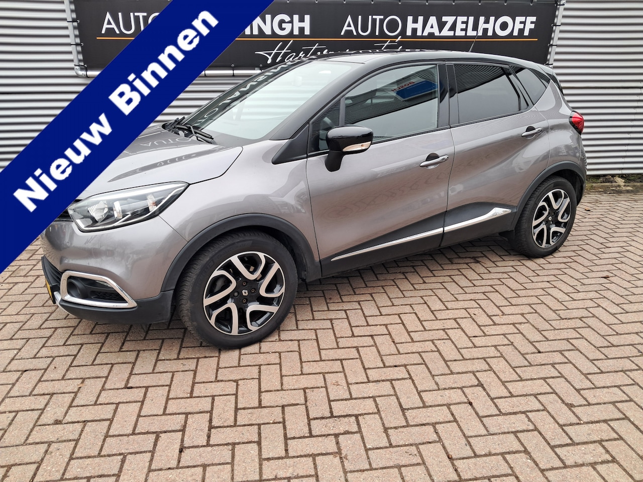 Renault Captur - 1.2 TCe Helly Hansen Automaat | Clima | Cruise control | LM Velgen | Trekhaak | Privacy gl - AutoWereld.nl