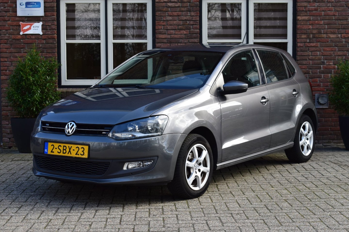 Volkswagen Polo - 1.2 TSI Airconditioning | Parkeersensoren | Cruise control - AutoWereld.nl