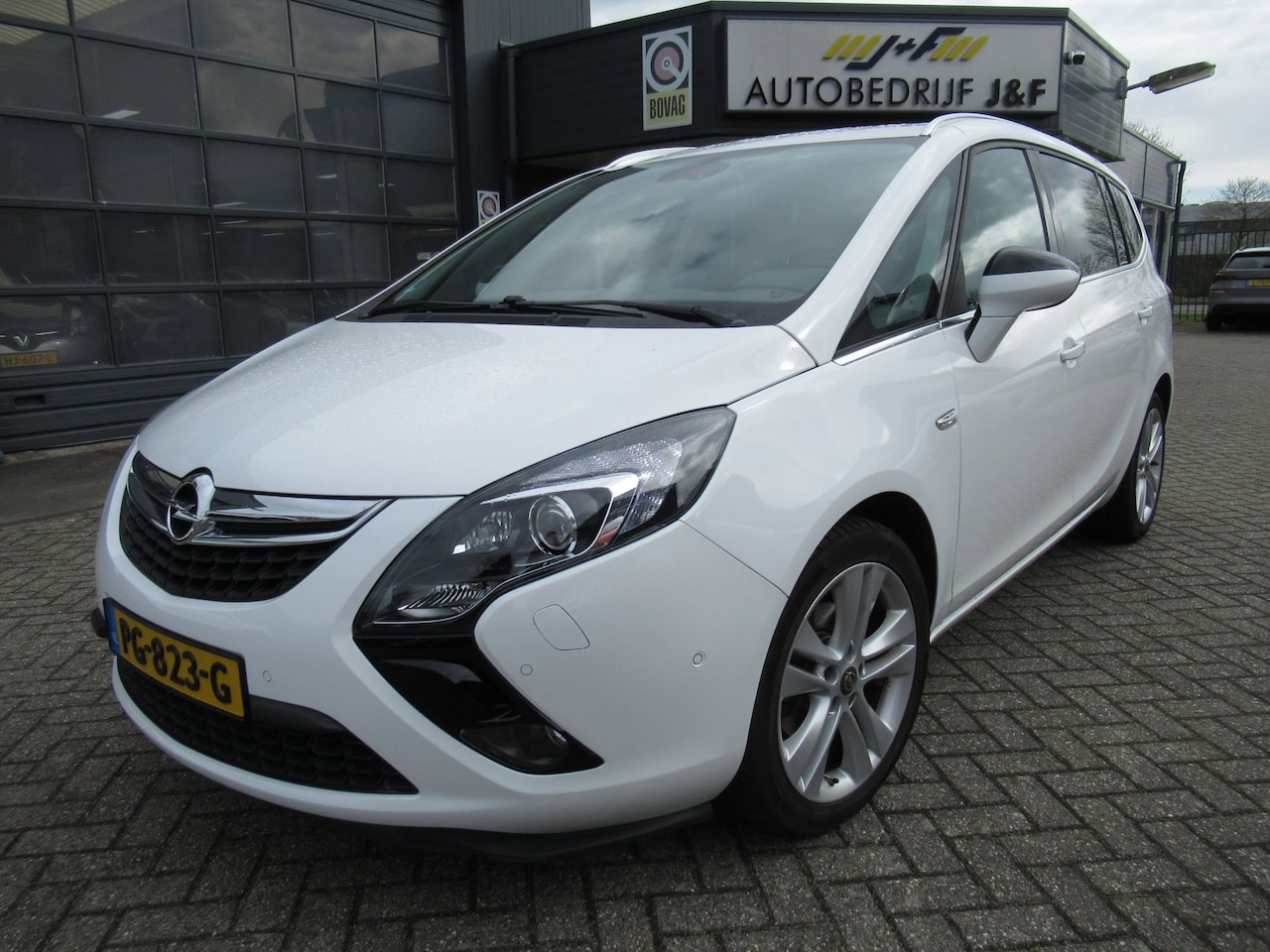 Opel Zafira Tourer - 1.4 Design Edition / AUTOMAAT / NAV / PDC / CAMERA - AutoWereld.nl