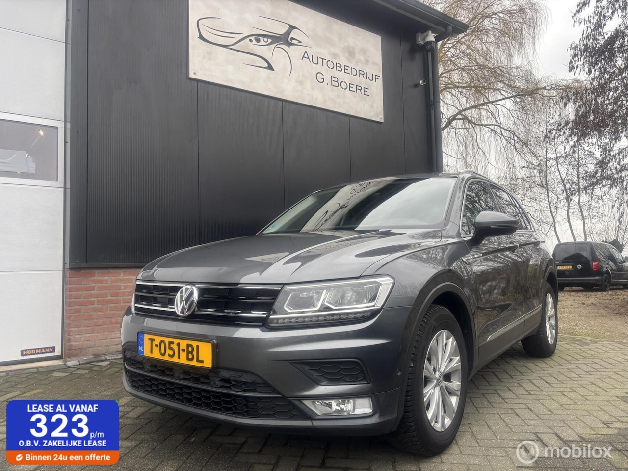 Volkswagen Tiguan - 1.4 TSI ACT Comfortline | Bomvol | Pano | - AutoWereld.nl