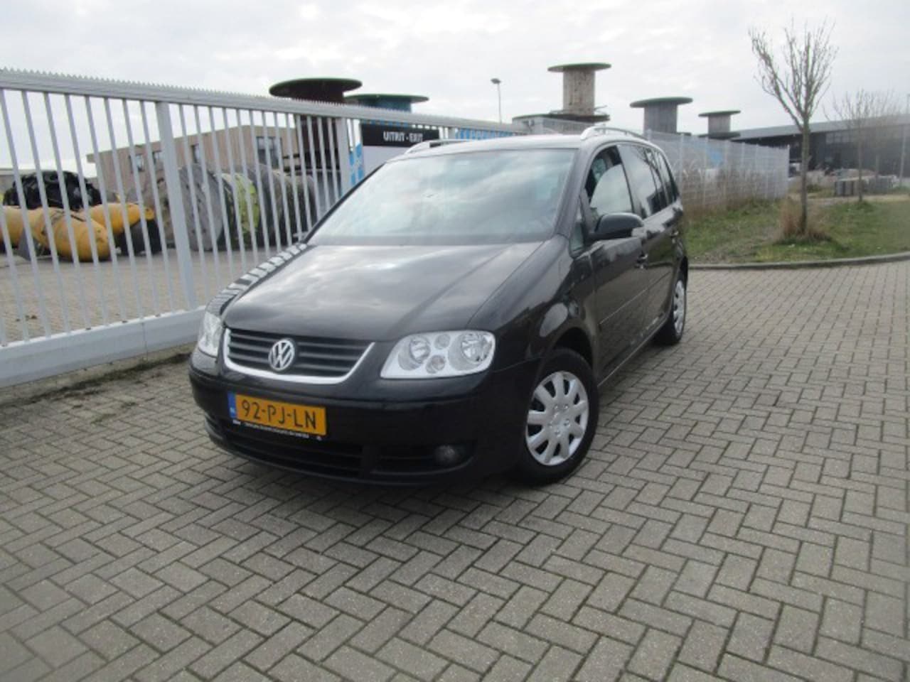 Volkswagen Touran - 1.6-16V FSI Highline Automaat, 7 Persoons - AutoWereld.nl