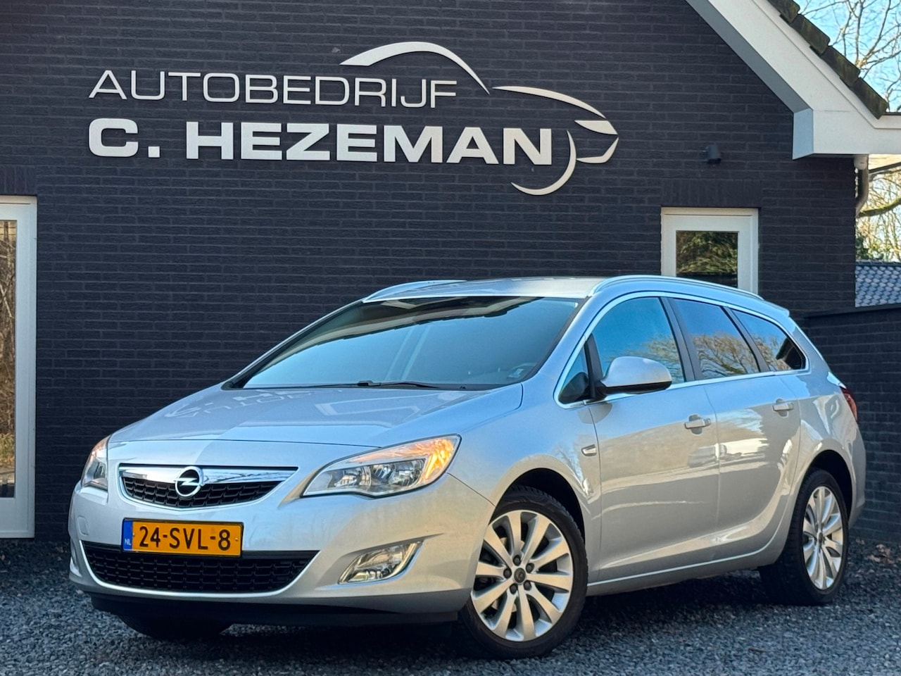 Opel Astra Sports Tourer - 1.4 Turbo Cosmo Navigatie Cruise Control Climate Control AUX USB LEER - AutoWereld.nl