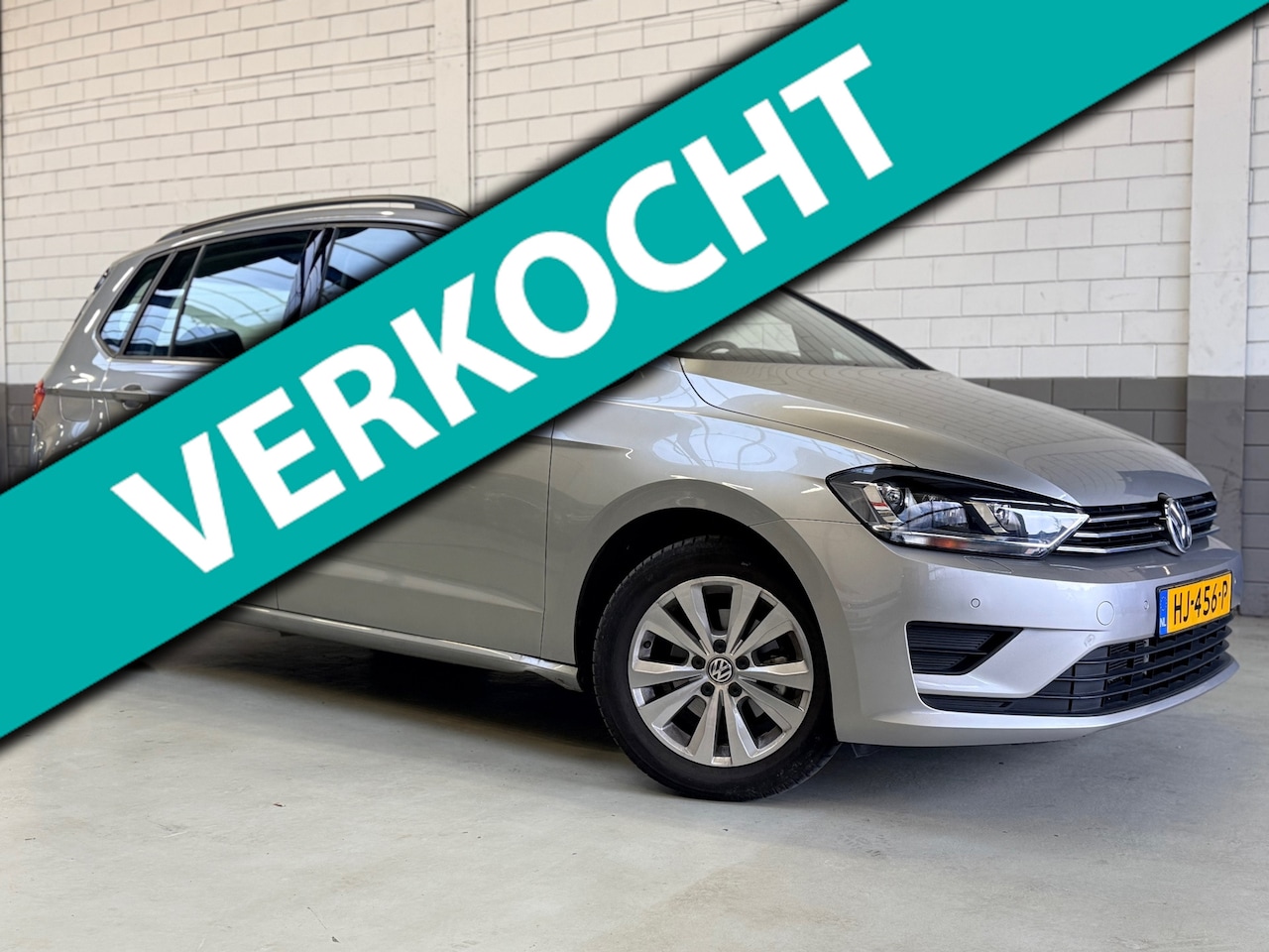 Volkswagen Golf Sportsvan - 1.2 TSI Highline Automaat - AutoWereld.nl