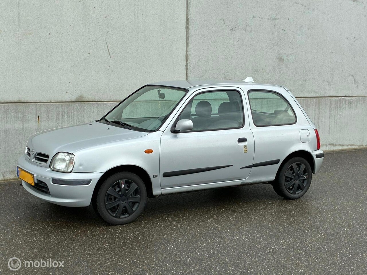 Nissan Micra - 1.3 GL N-CVT 132056 km NAP AIRCO AUTOMAAT - AutoWereld.nl