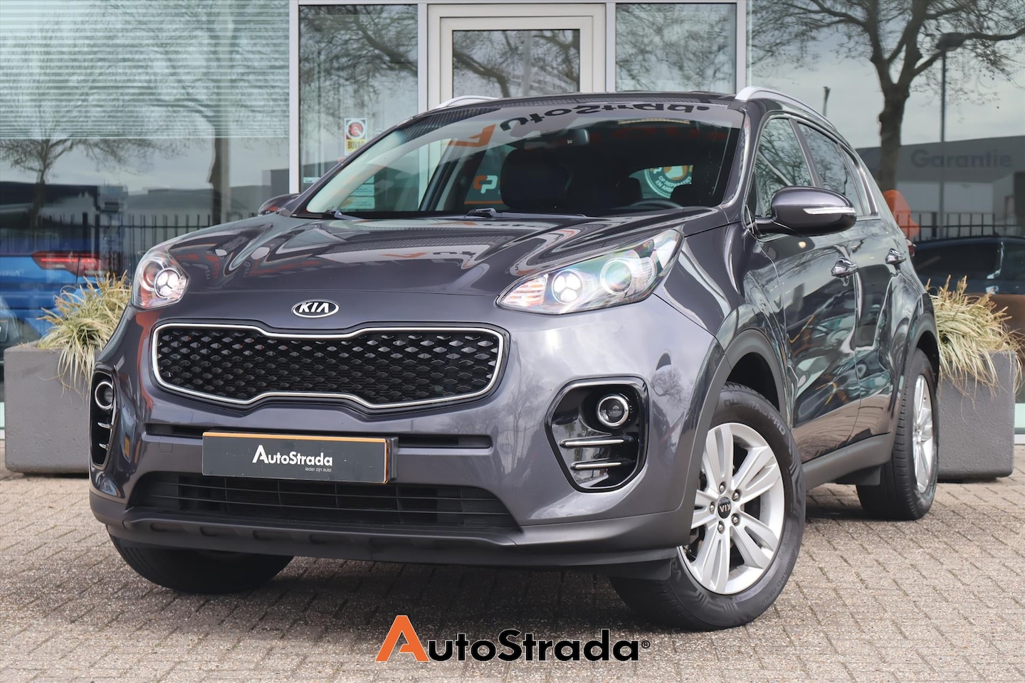 Kia Sportage - 1.6 DynamicLine GDi 132pk | Trekhaak | Navigatie | Climate | Sensoren | Cruise - AutoWereld.nl