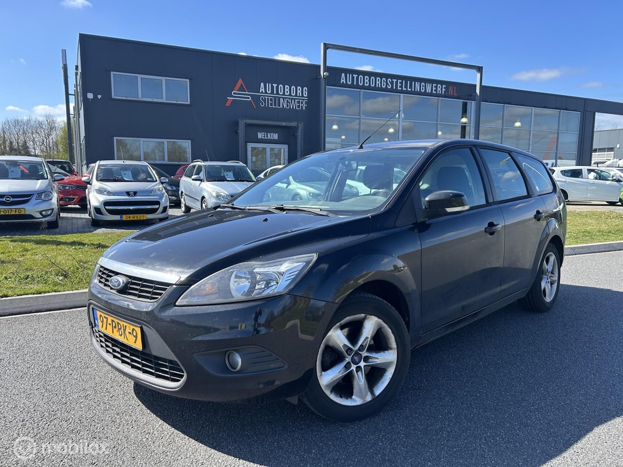 Ford Focus Wagon - 1.6 TDCi Comfort [ NAP navi airco trekhaak ] - AutoWereld.nl