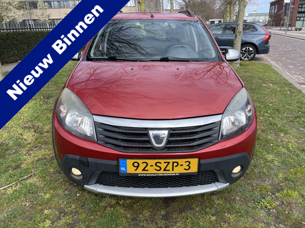 Dacia Sandero Stepway - 1.6 LPG Zuinig hoge zit AIRCO nap nl auto motor kap wat blanke lak af zie foto’s - AutoWereld.nl