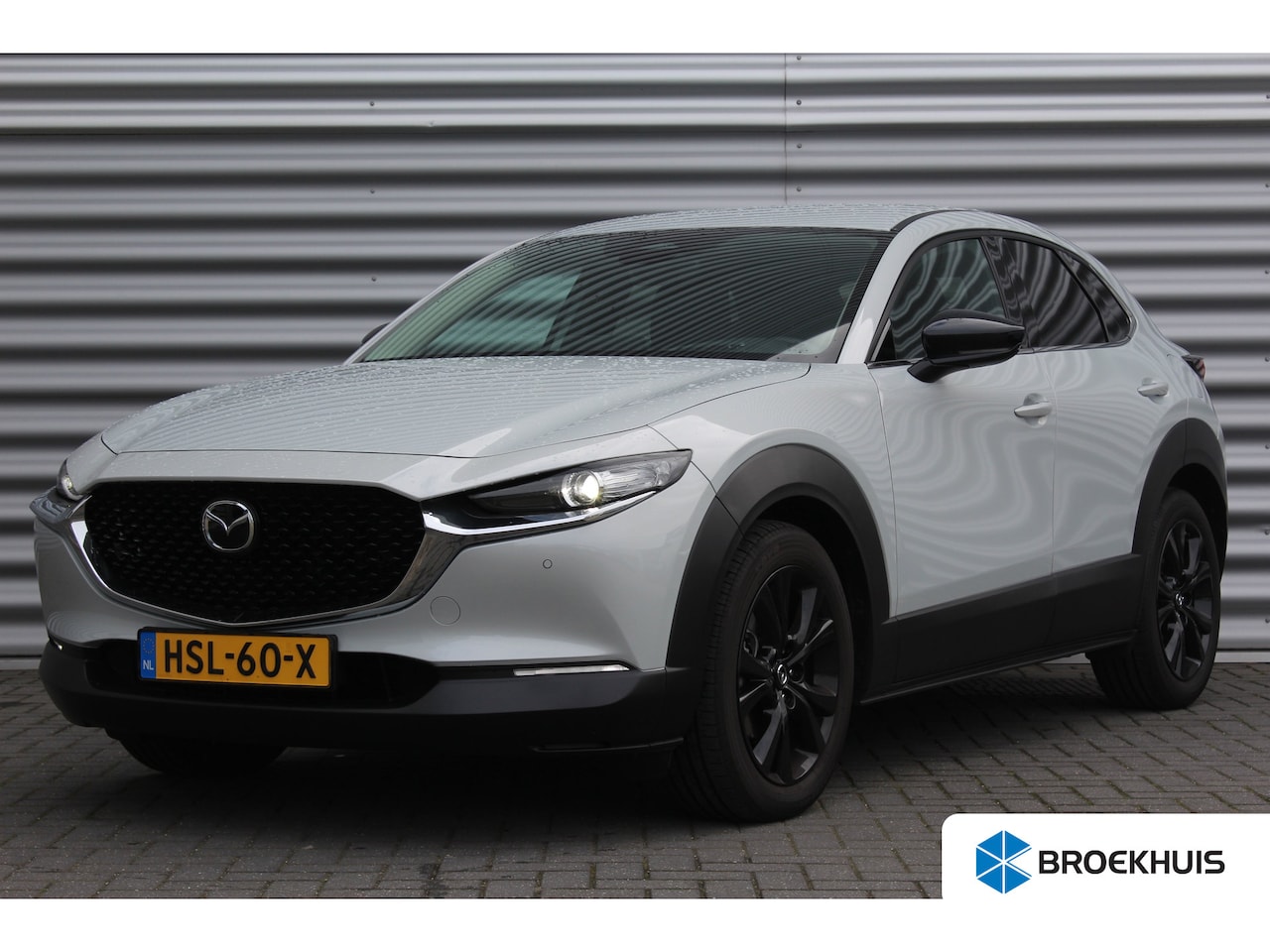 Mazda CX-30 - 2.5 e-SKYACTIV-G M HYBRID 140PK HOMURA AUTOMAAT / NAVI / CLIMA / FULL-LED / PDC / 18" LMV - AutoWereld.nl