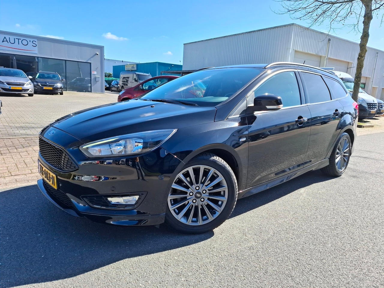 Ford Focus Wagon - 1.0 ST LINE NAVI/CLIMA/CRUISE/PDC/BLACK! - AutoWereld.nl