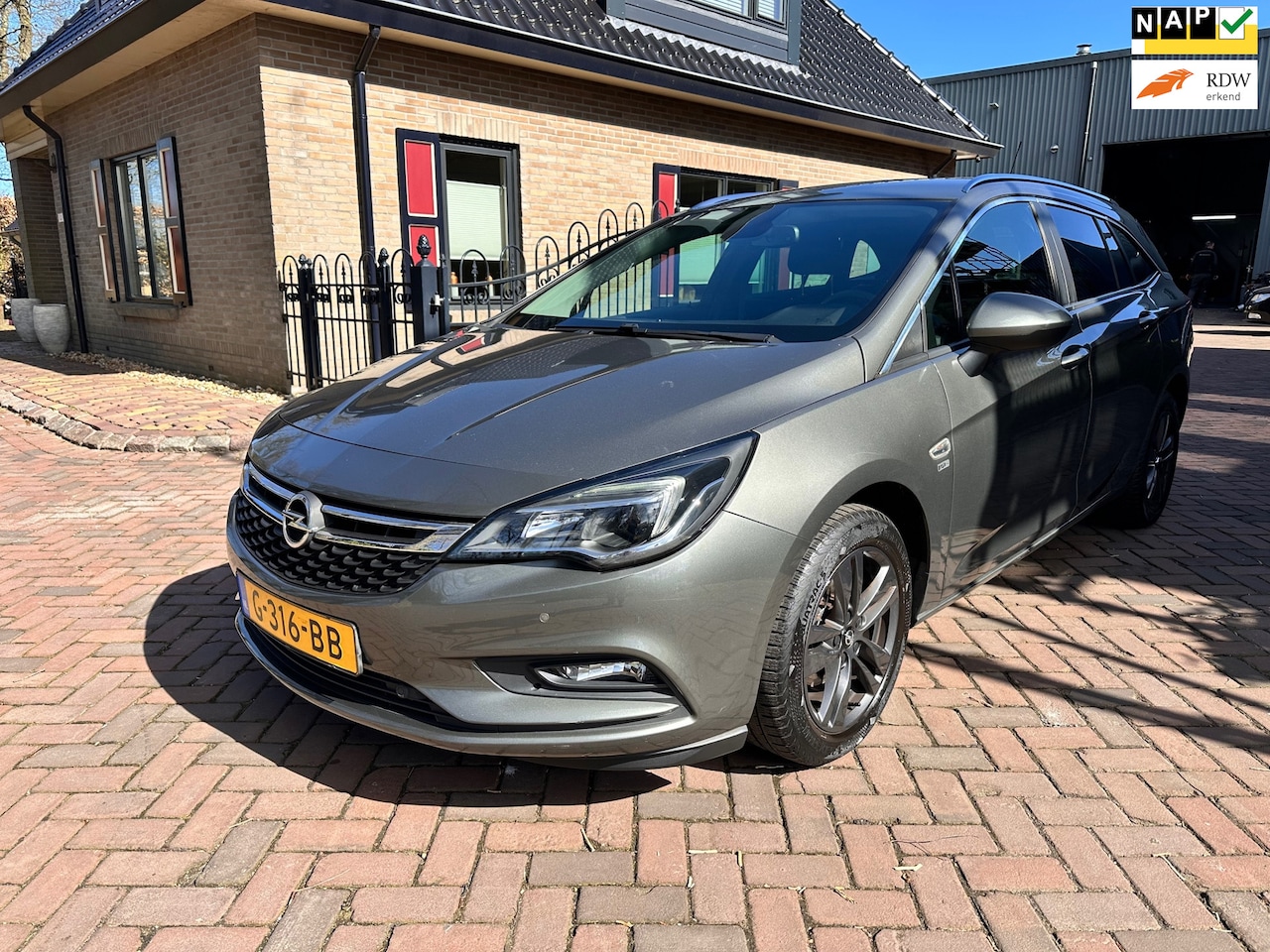 Opel Astra Sports Tourer - 1.0 Turbo 120 Jaar Edition 1.0 Turbo 120 Jaar Edition - AutoWereld.nl