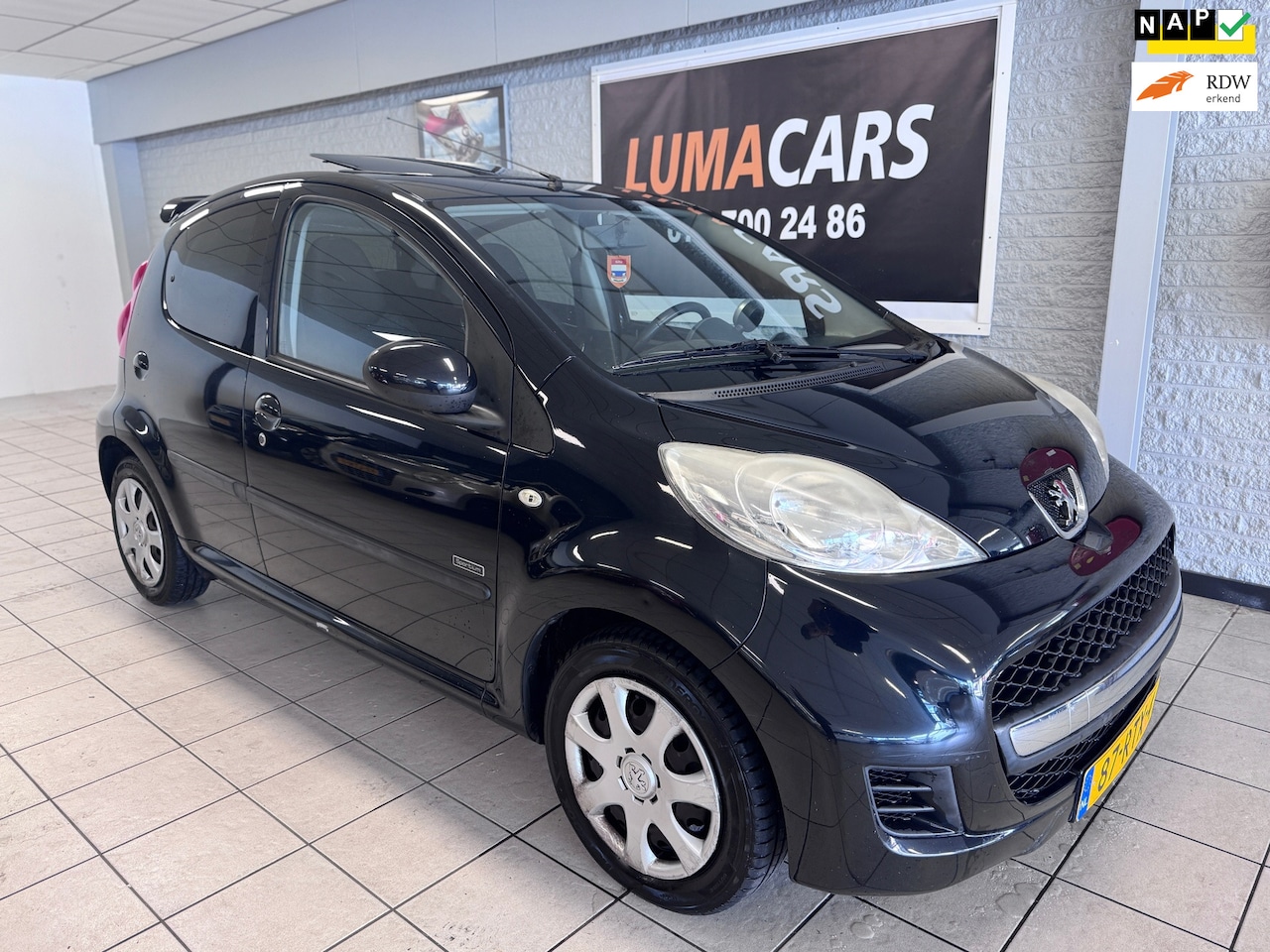 Peugeot 107 - 1.0-12V Sportium 1.0-12V Sportium - AutoWereld.nl