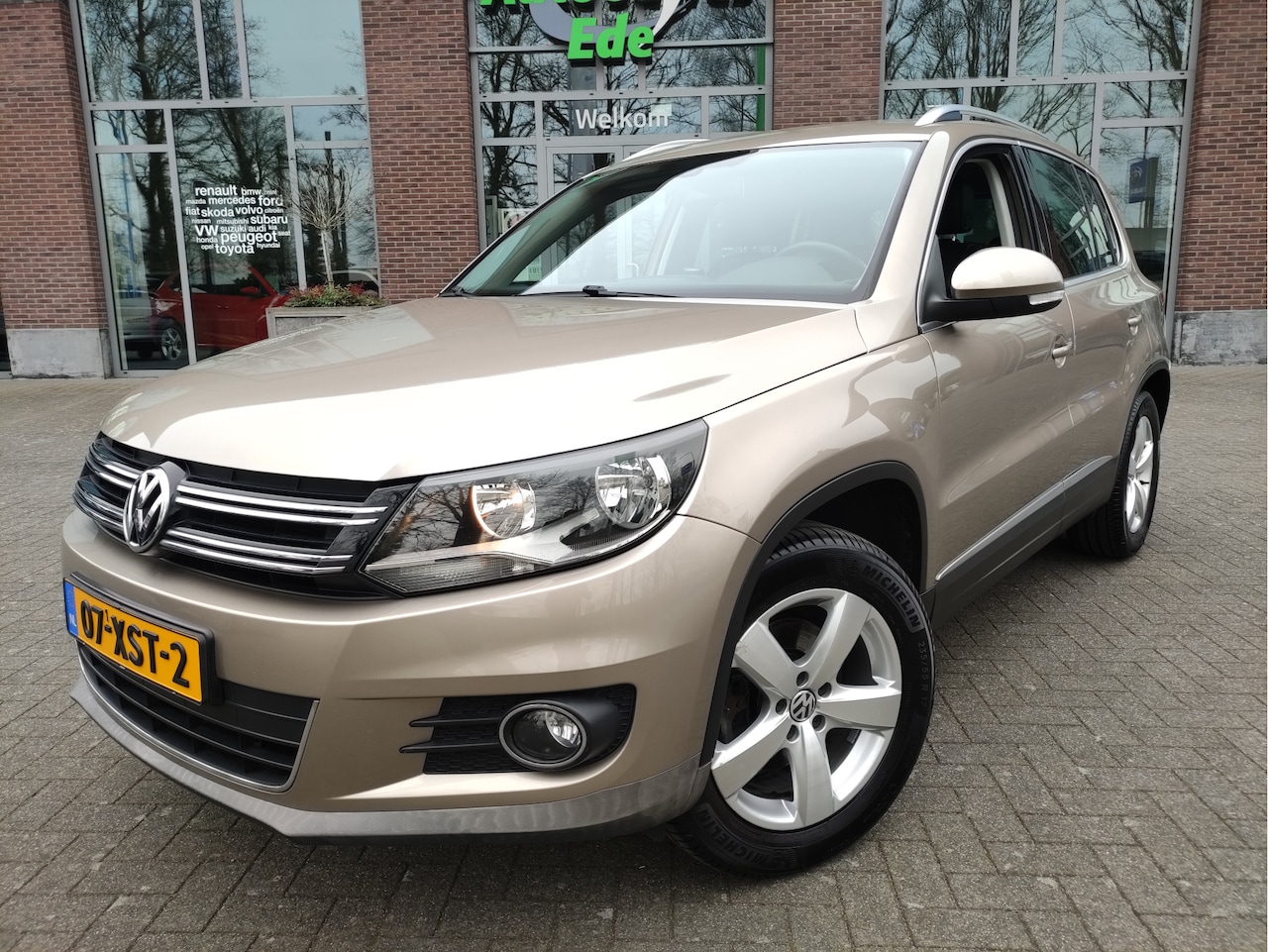 Volkswagen Tiguan - 1.4 TSI Sport&Style Trekhaak - Leder - Navigatie - Climatronic - AutoWereld.nl