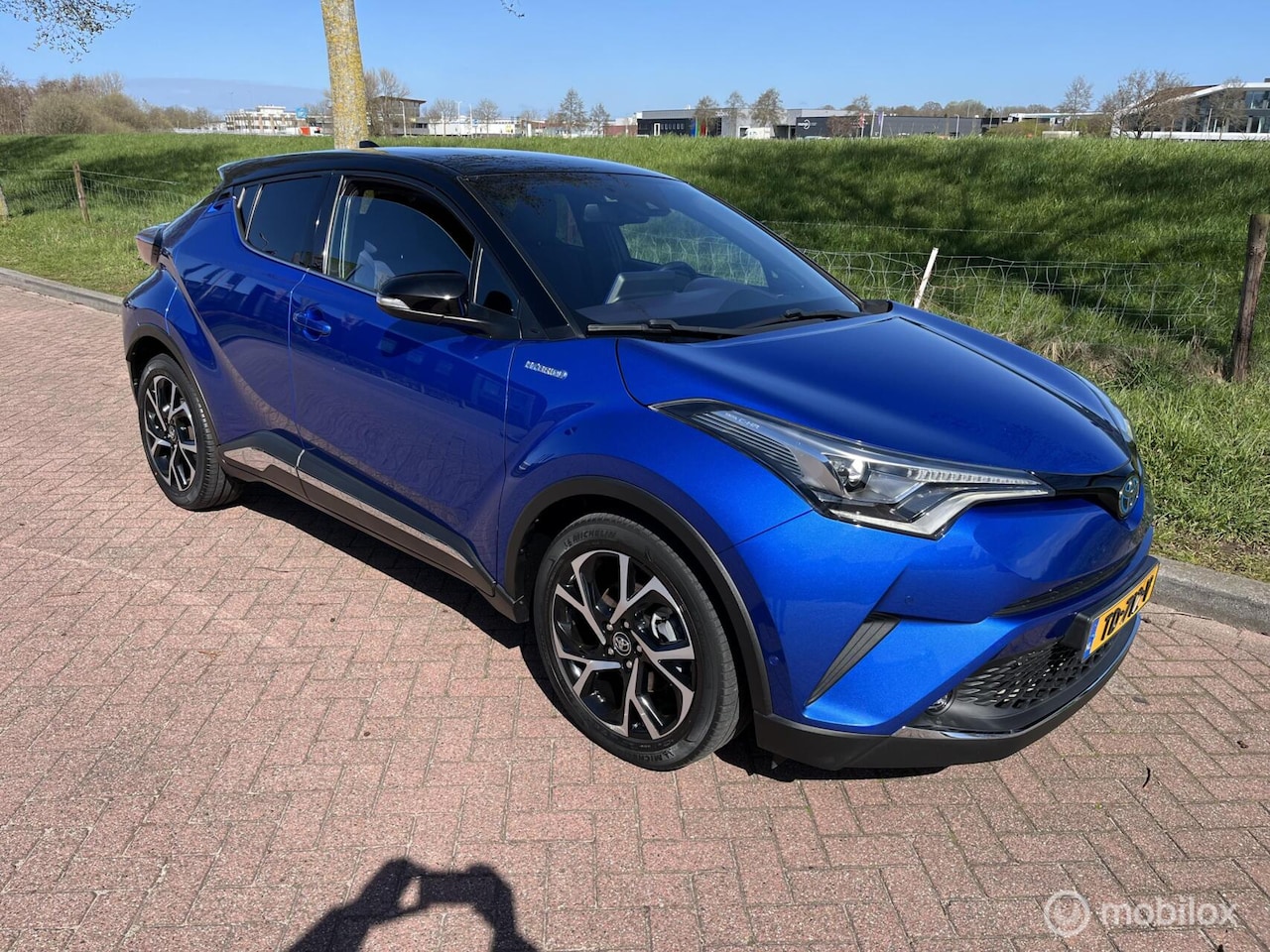 Toyota C-HR - 1.8 Hybrid Bi-Tone | 1e Eigenaar | Afn.Trekhaak - AutoWereld.nl
