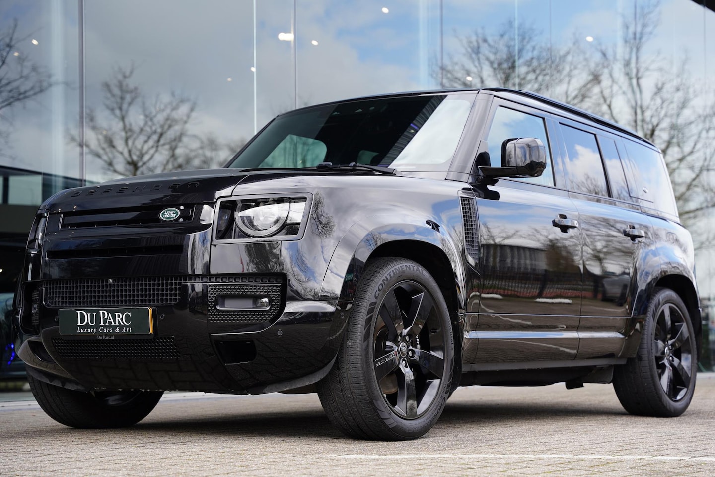 Land Rover Defender 110 - P400 E X-Dynamic HSE Black & Tan Leder / 22 Inch / Panoramadak - AutoWereld.nl