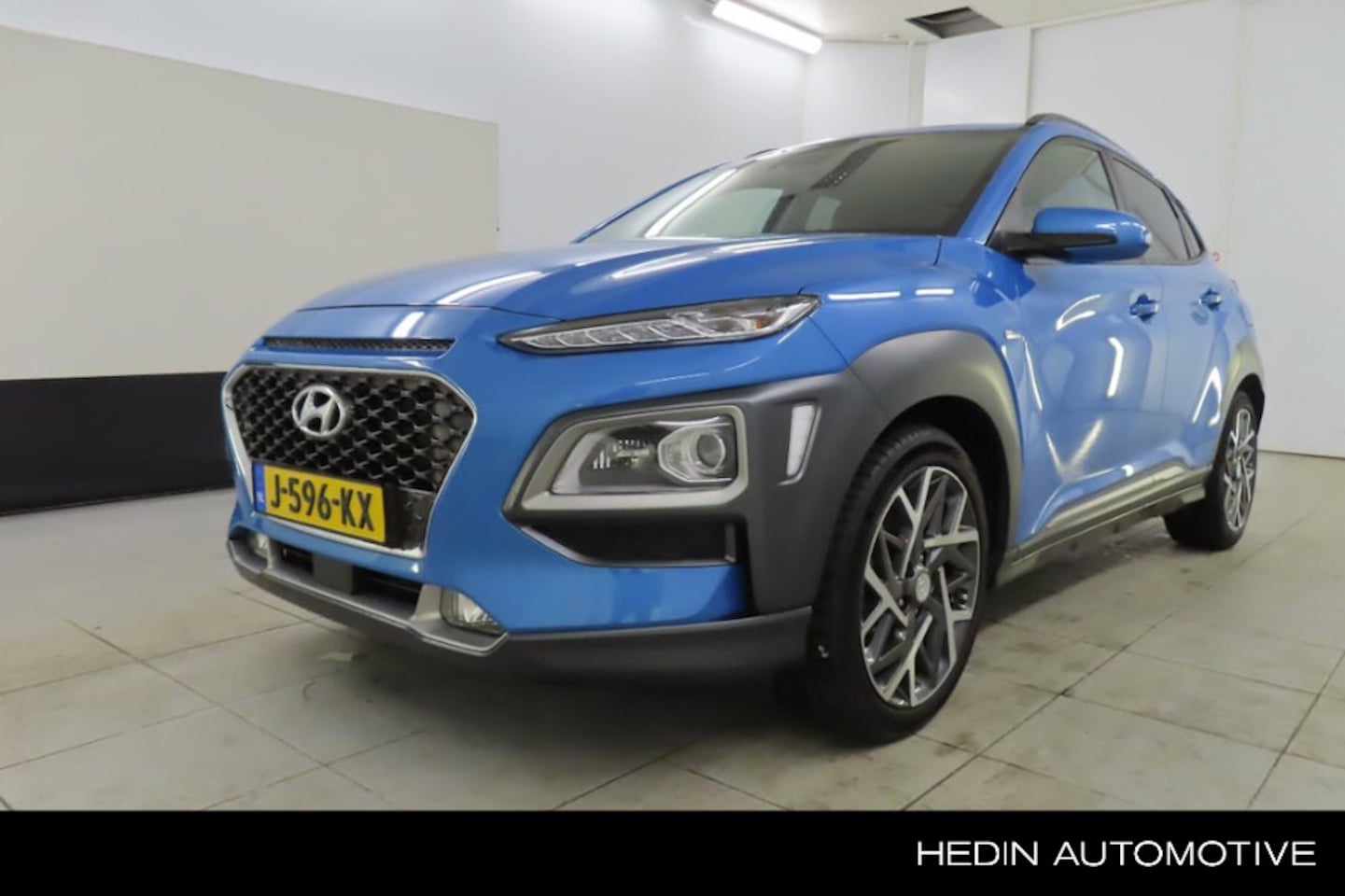 Hyundai Kona - 1.6 GDI HEV Premium Sky | Leder | Schuifdak | Trekhaak | Adaptive Cruise | Stoel + Stuurve - AutoWereld.nl