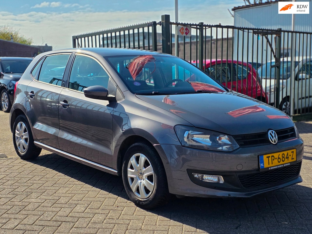 Volkswagen Polo - 1.2-12V BlueMotion Trendline Airco cruis control cv op afs elektrische ramen parkeer senso - AutoWereld.nl