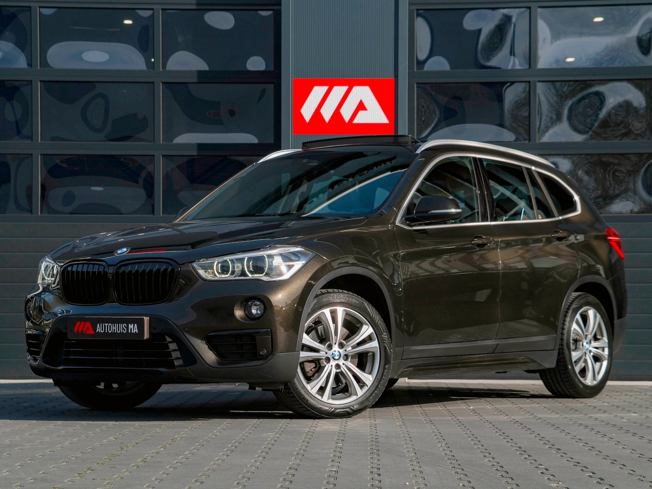 BMW X1 - XDrive20i Centennial High Executive - AutoWereld.nl