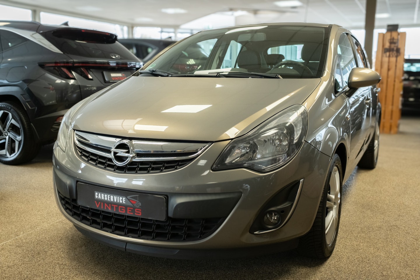 Opel Corsa - 1.2-16V BlitZ PDC, Clima, Navi, 5DR, L/m velgen, Trekhaak! - AutoWereld.nl