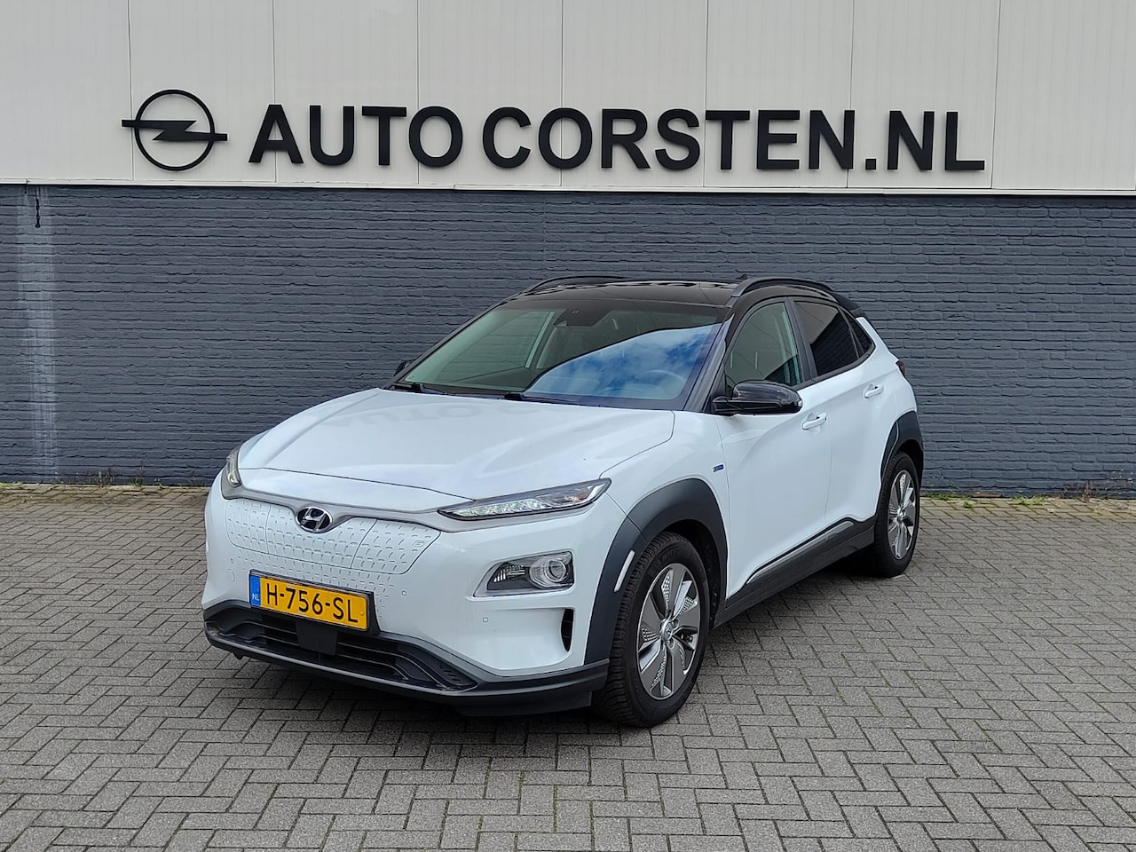 Hyundai Kona Electric - EV 64kWh 204pk SOH 100% Leer Premium Schuif-/Kanteldak Warmtepomp Head-Up Display Apple Ca - AutoWereld.nl