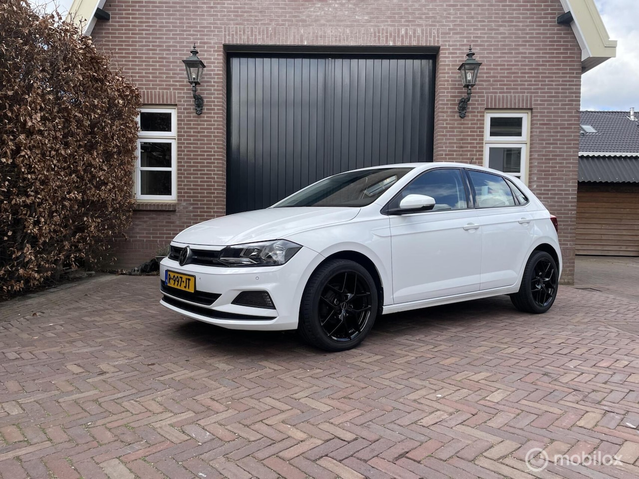 Volkswagen Polo - 1.0 TSI Comfortline STOELVERW | PARK | 17 LM - AutoWereld.nl