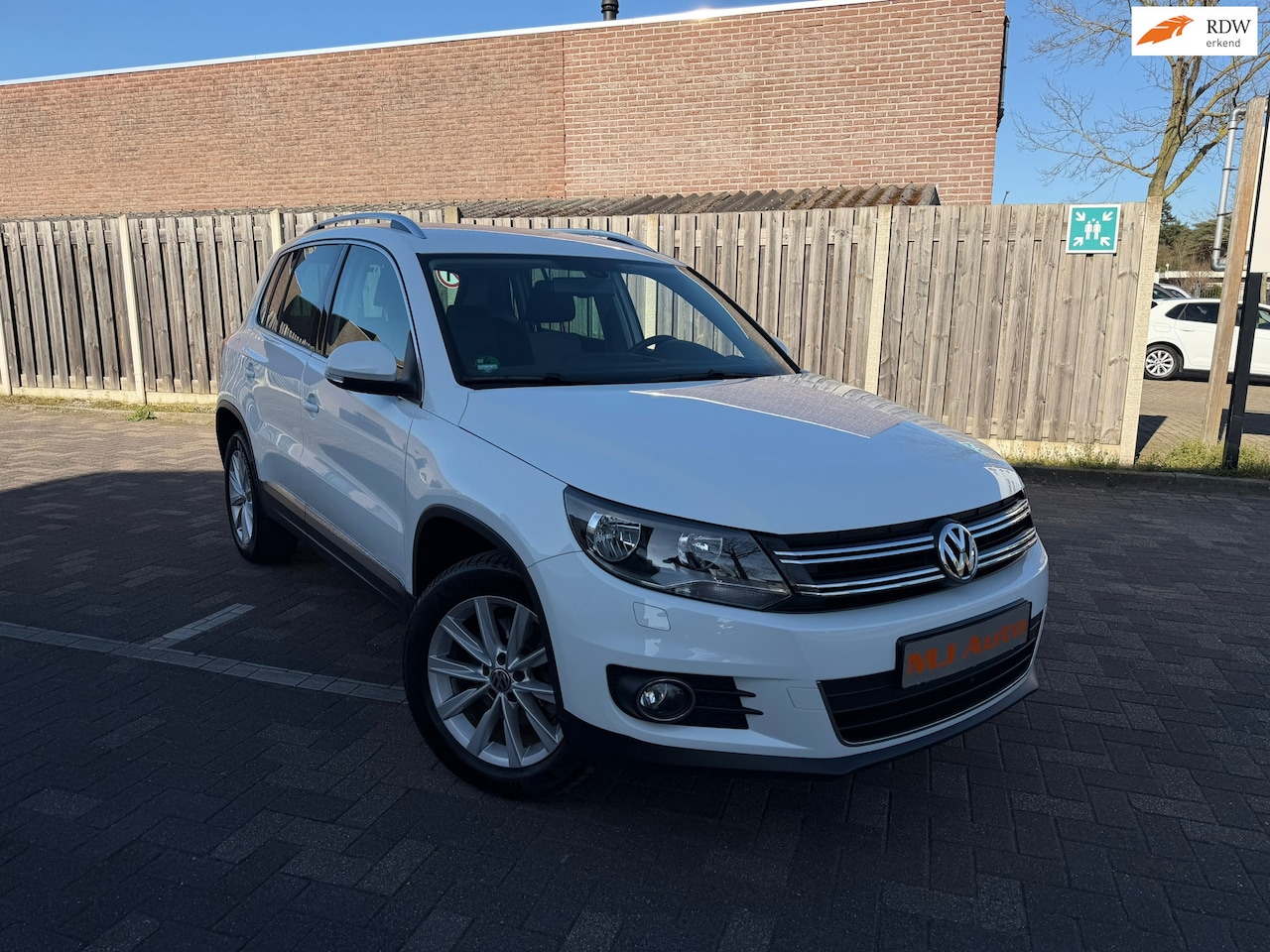 Volkswagen Tiguan - 2.0 TSI Sport&Style 4Motion - AutoWereld.nl