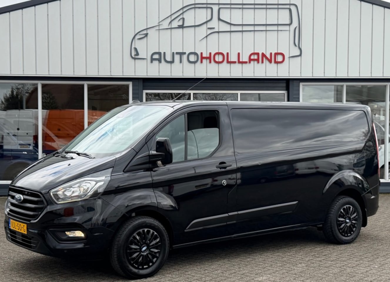 Ford Transit Custom - 2.0 TDCI 96KW 131PK L2H1 EURO 6 AIRCO/ CRUISE CONTROL/ NAVIGATIE/ 100% DEALERONDERHOUDEN - AutoWereld.nl