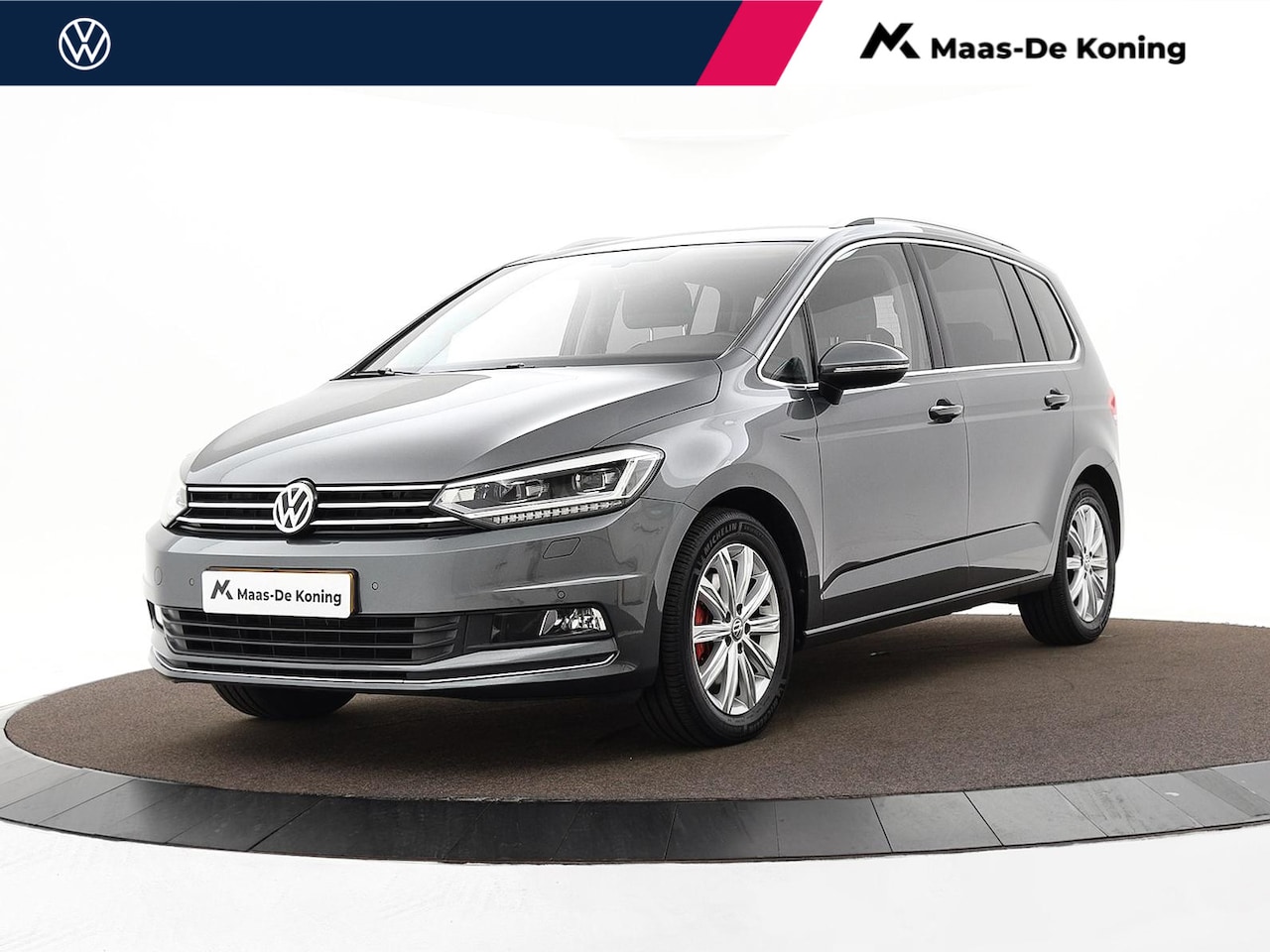 Volkswagen Touran - 1.4 TSI 150pk DSG Highline 7p · Camera · Keyless · Massagefunctie Bestuurder · Stoelverwar - AutoWereld.nl