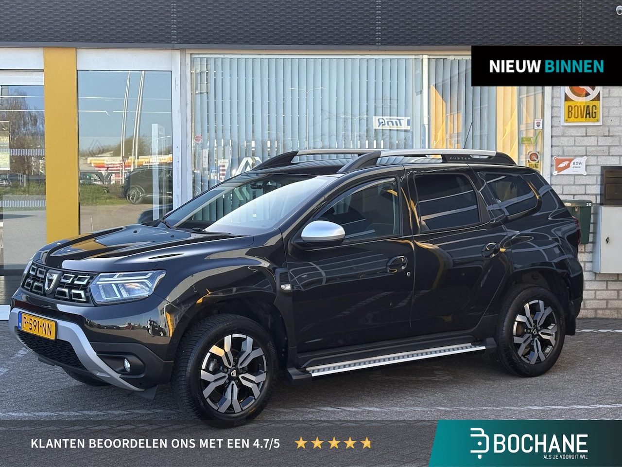 Dacia Duster - 1.0 TCe Bi-Fuel Prestige | NAP | Trekhaak | Navigatie | Achteruitrijcamera | LED | Stoelve - AutoWereld.nl