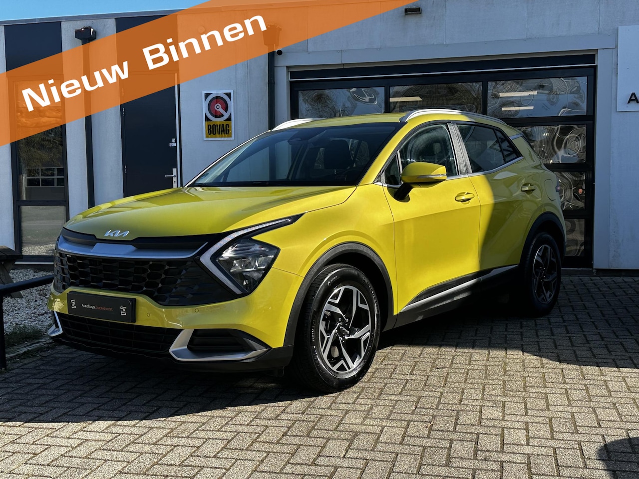 Kia Sportage - 1.6 T-GDi MHEV ComfortLine Carplay & Camera | Stoel-/Stuurverwarming | Splash Lemon - AutoWereld.nl