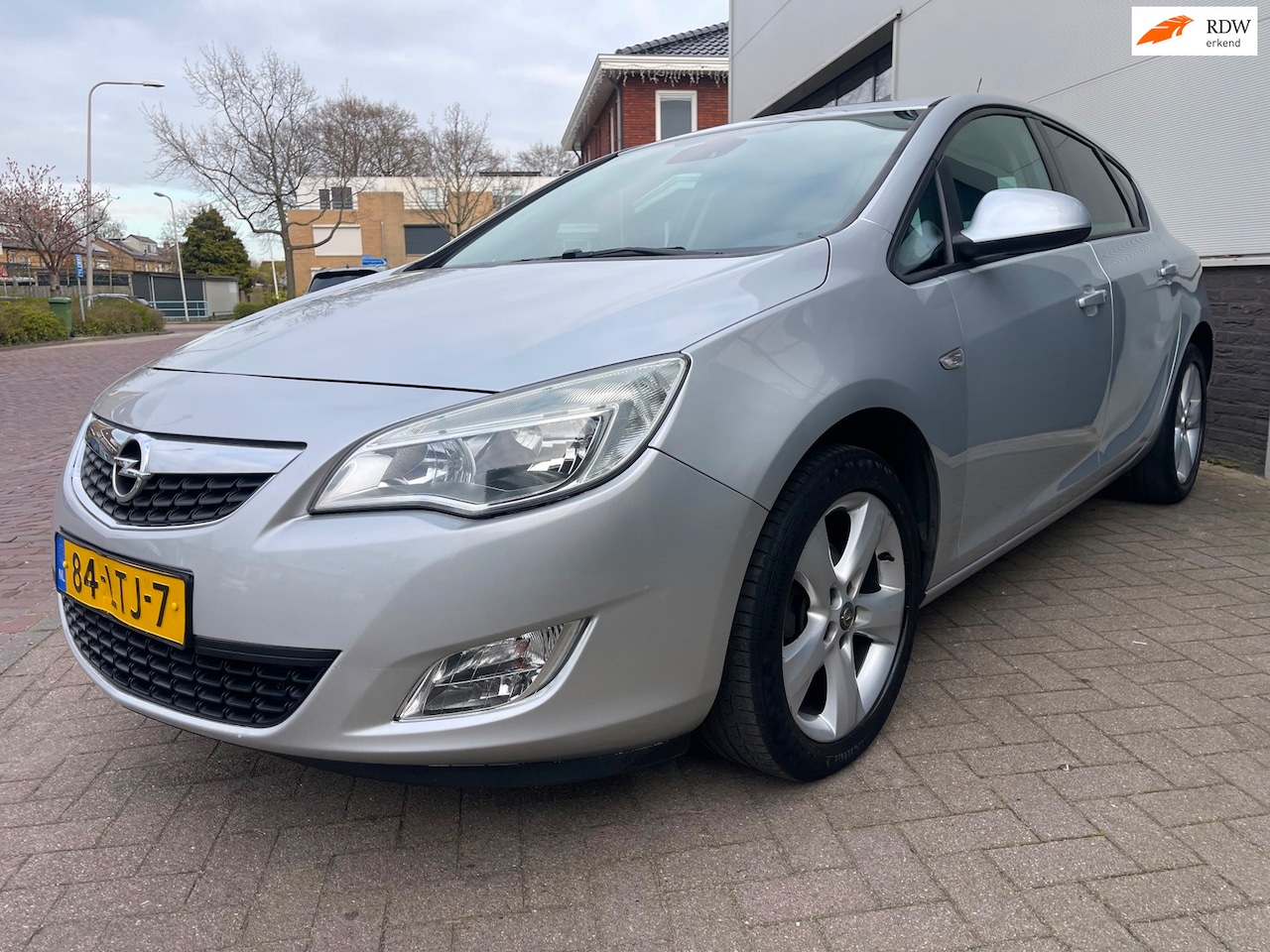 Opel Astra - 1.4 Edition/Cruise-c/Climate-c/Aux/Trekhaak/Goed-onderhouden/Sfeerverlichting - AutoWereld.nl