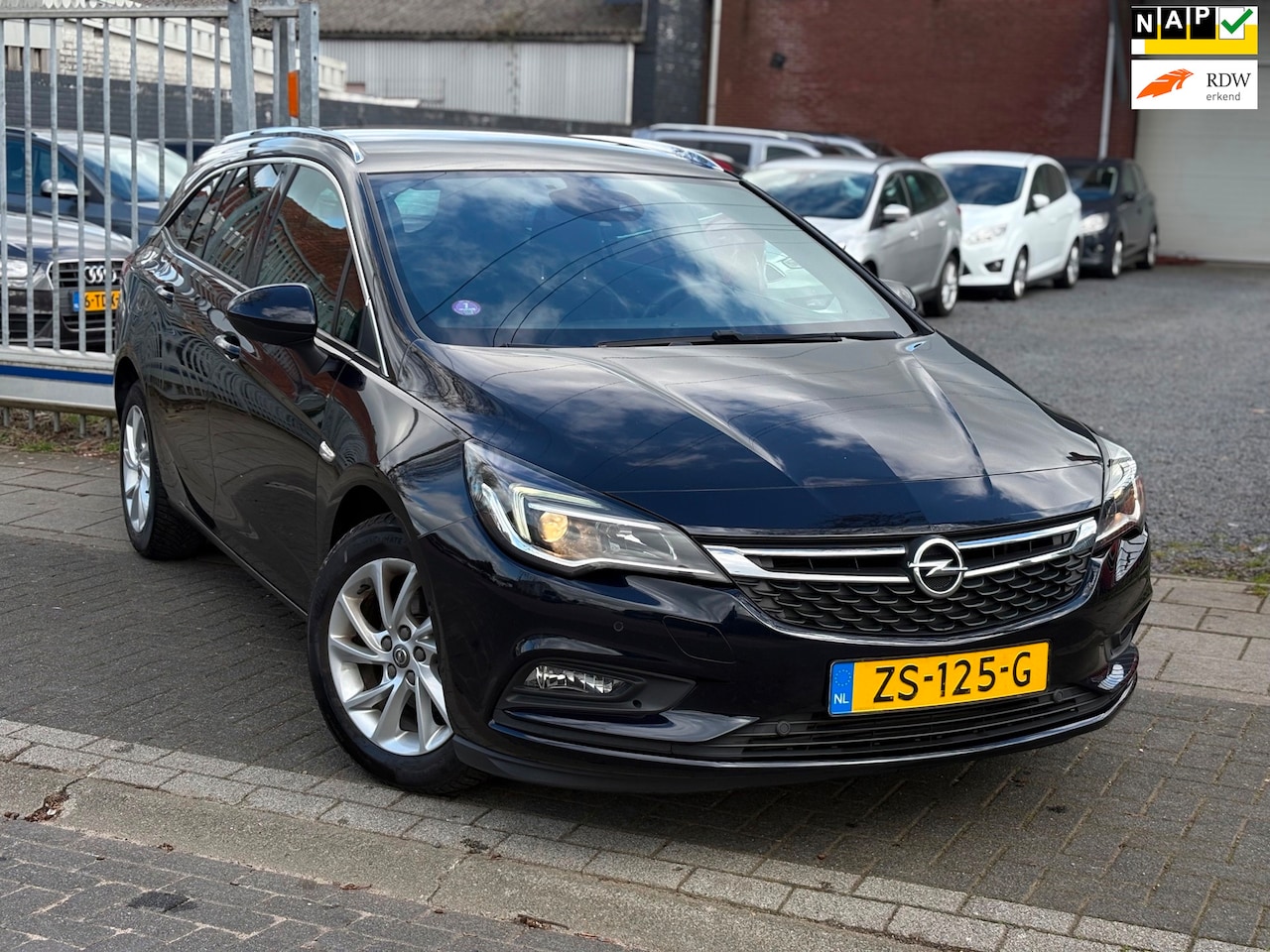 Opel Astra Sports Tourer - 1.0 Turbo Business Executive | Trekhaak | A.Camera | LED | Half leder | - AutoWereld.nl