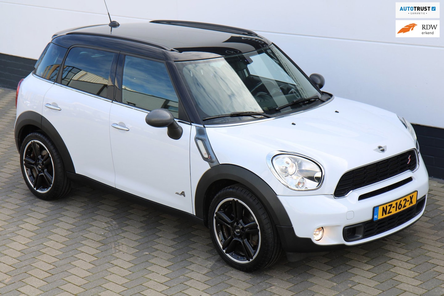 MINI Countryman - 1.6 Cooper S ALL4 Navi Xenon Leer Navi APK !! - AutoWereld.nl