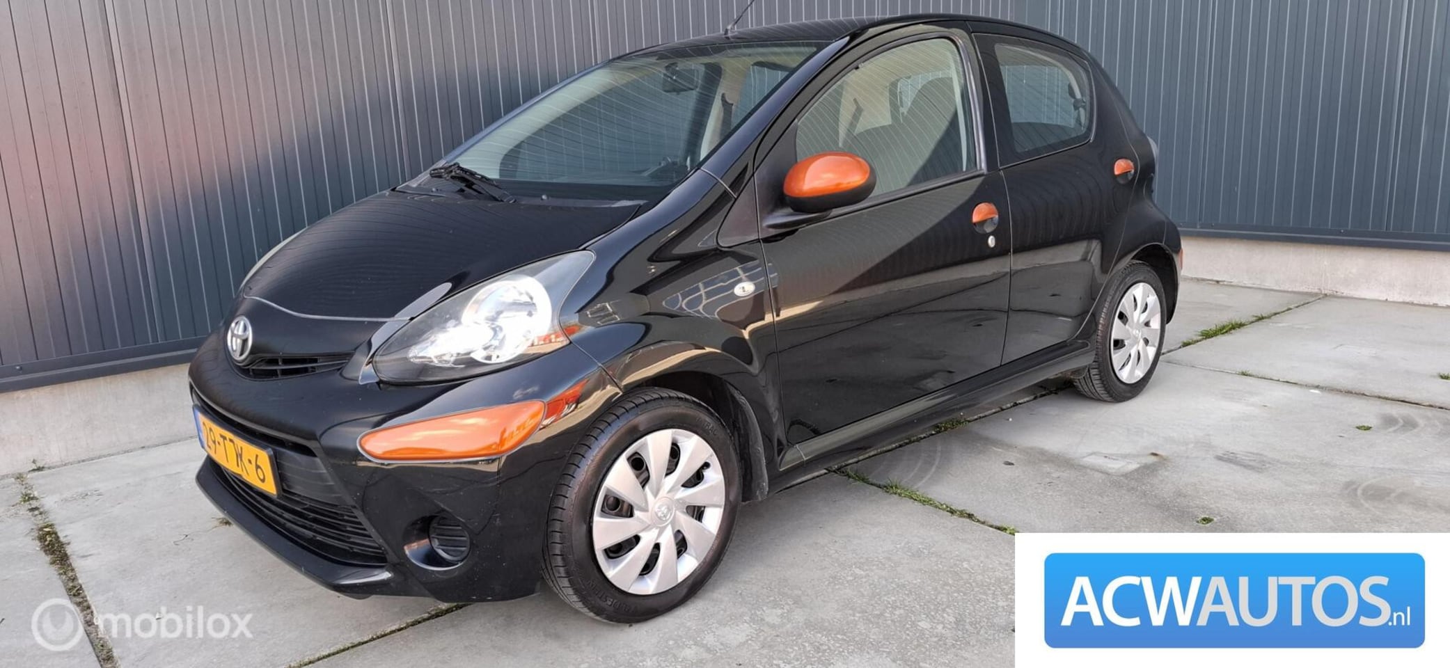 Toyota Aygo - 1.0 VVT-i Comfort Orange 1.0 VVT-i Comfort Orange - AutoWereld.nl