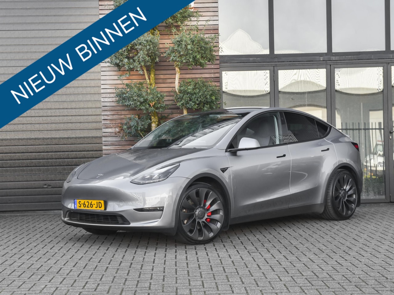 Tesla Model Y - Performance AWD 75 kWh Ruim 460Pk, Panorama, leer, 21 Inch - AutoWereld.nl