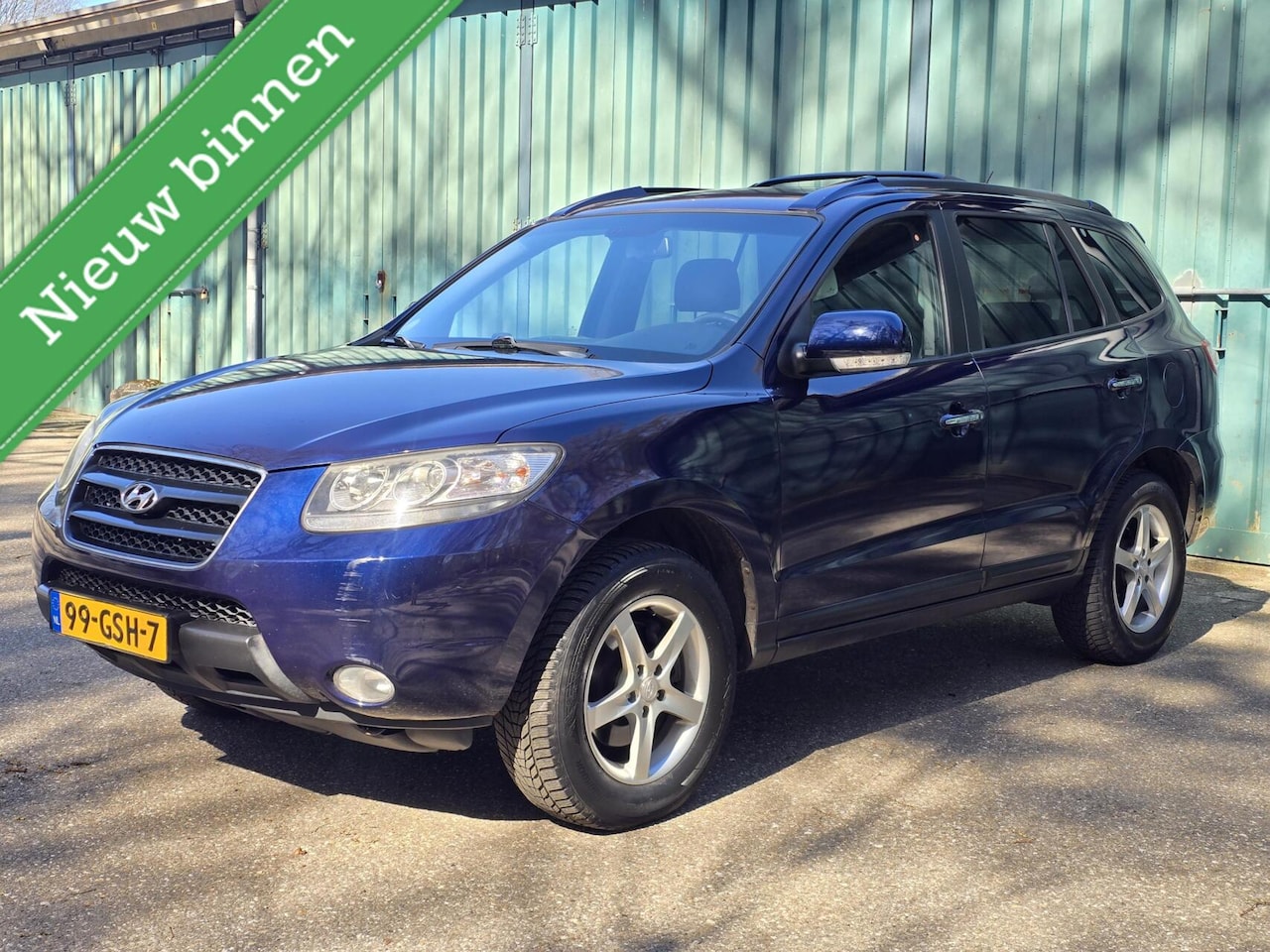 Hyundai Santa Fe - 2.7i V6 4WD Style | Camera | Trekhaak - AutoWereld.nl