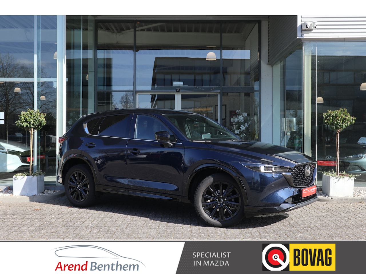 Mazda CX-5 - 2.0 e-SkyActiv-G M Hybrid 165 Homura Trekhaak / Bose / Camera / Head-Up / Leer / Navi / Cl - AutoWereld.nl