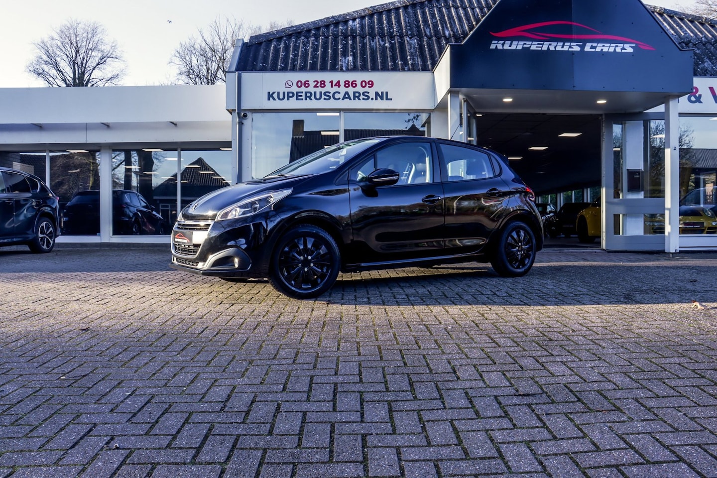 Peugeot 208 - 1.2 PureTech Blue Lion NAP/Cruise/Carplay/Navi/Riem vv - AutoWereld.nl