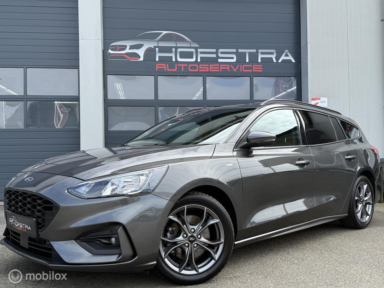 Ford Focus Wagon - 1.0 EcoBoost Hybrid ST Line Camera Winterpack Trekhaak - AutoWereld.nl