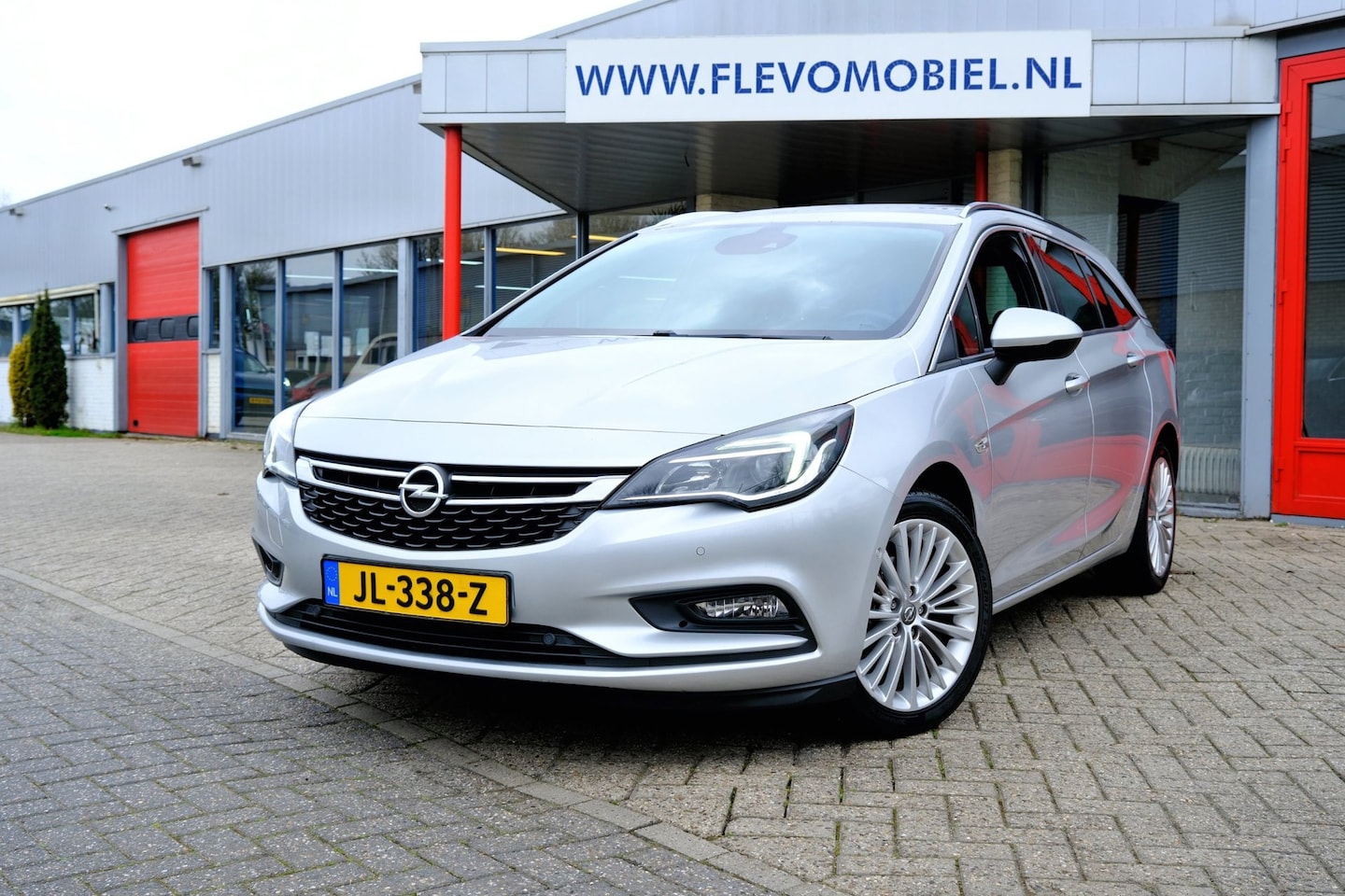 Opel Astra Sports Tourer - 1.4 150PK Innovation Half leder|Clima|Navi|DAB - AutoWereld.nl