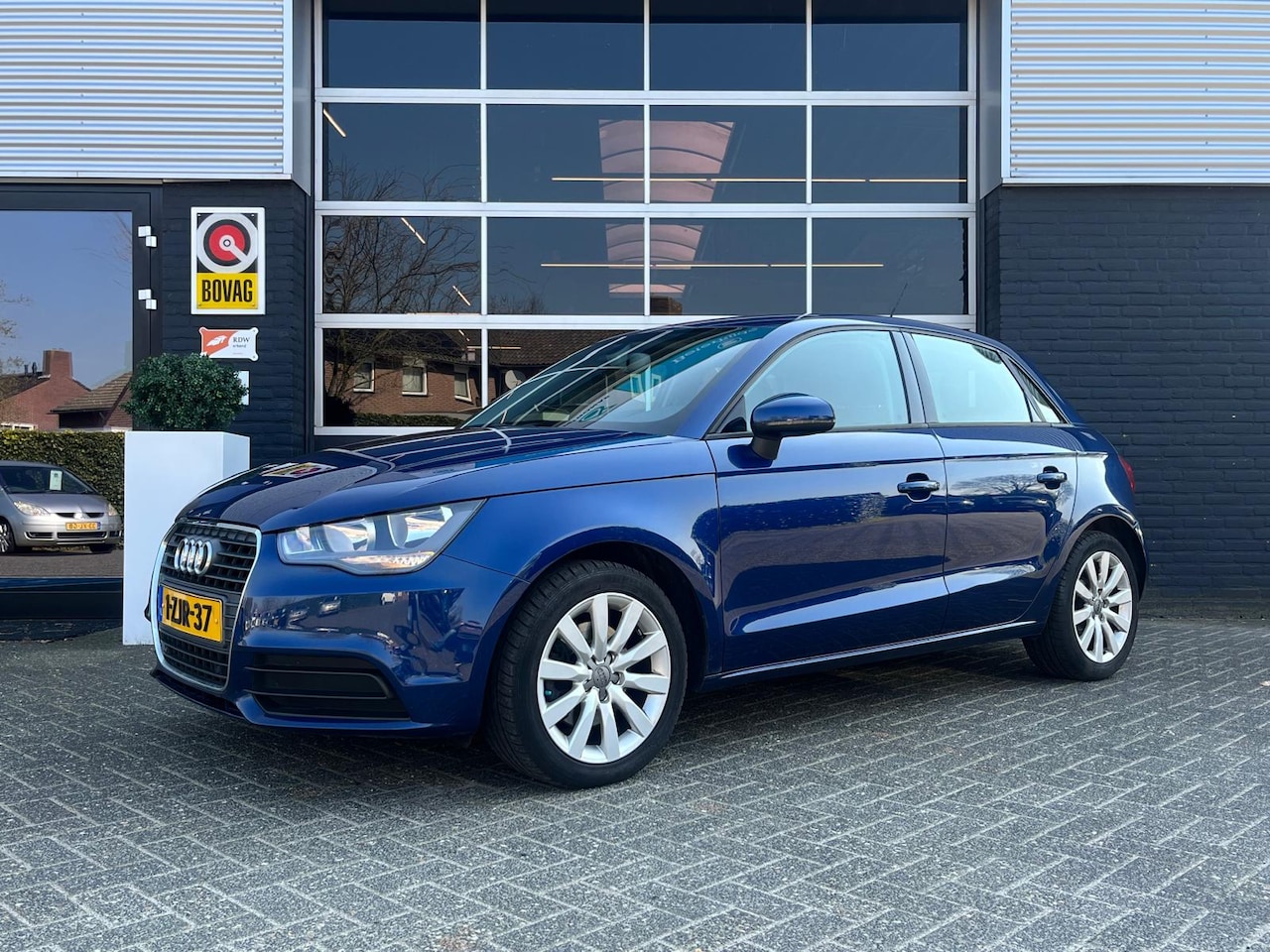 Audi A1 Sportback - 1.4 TFSI Attraction Pro Line 1.4 TFSI Attraction Pro Line, Automaat, Bluetooth, Cruise, Trekhaak, Navi, PDC, NAP - AutoWereld.nl